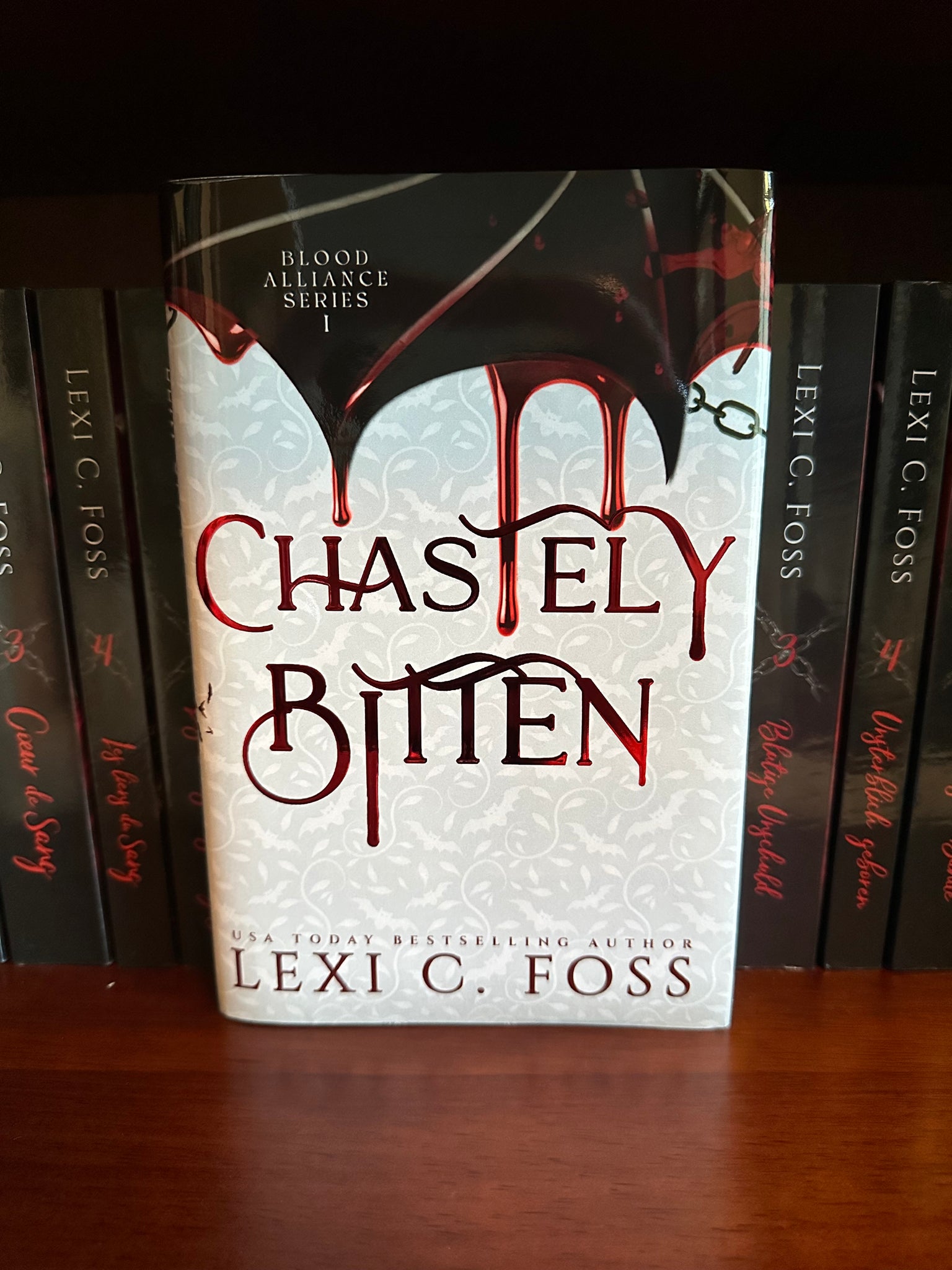 Chastely Bitten- Hardcover- Foiled with No Edging (Blood Alliance: Book 1)